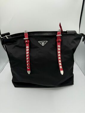 Prada Black Nylon Tote with Red Accent Straps and studded detailing